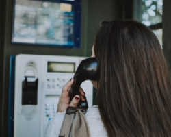 Woman in Phone Booth